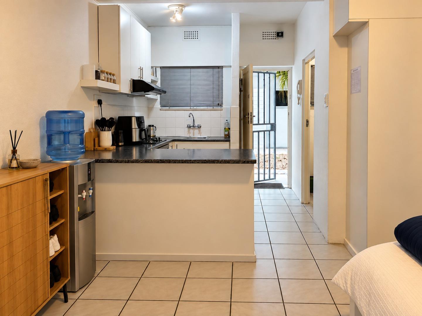 769370_Clean_Minimalist_Kitchen_and_Entryway.jpg